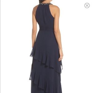 Eliza J. Beaded halter tiered chiffon gown.